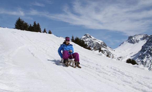 Tobogganing in the middle of the winter sports area